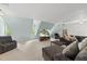 Living room featuring plush furniture, TV, natural light, and a bright paint scheme at 5513 Doemont Dr, Apex, NC 27539
