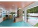 Outdoor bar with brick detailing and a view of the swimming pool at 5513 Doemont Dr, Apex, NC 27539