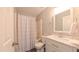 Bathroom with shower and updated vanity at 5535 Spindlewood Ct, Durham, NC 27703