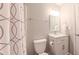 Bathroom with shower and updated vanity at 5535 Spindlewood Ct, Durham, NC 27703