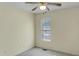 Bedroom with a ceiling fan and a window offering natural light at 5849 Rocking Chair Dr, Youngsville, NC 27596