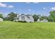 Charming home with a spacious front lawn, ideal for Gathering gatherings and outdoor entertainment at 5849 Rocking Chair Dr, Youngsville, NC 27596