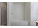 A bathtub with chrome fixtures, complemented by the shower at 5940 Brambleton Ave, Raleigh, NC 27610