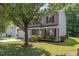 Two-story home with a garage and manicured lawn at 5940 Brambleton Ave, Raleigh, NC 27610
