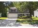 Two-story home with a front-facing garage and manicured lawn at 5940 Brambleton Ave, Raleigh, NC 27610