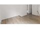 Neutral room with wood flooring at 5940 Brambleton Ave, Raleigh, NC 27610