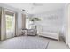 Cozy Bedroom with crib, chair, area rug and ample natural light at 601 Culpepper Ct, Durham, NC 27712