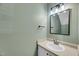 Cozy bathroom with single vanity, brushed nickel faucet, and overhead lighting at 6513 Hearthstone Dr, Raleigh, NC 27615