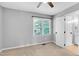 Bedroom featuring a window, an ensuite bathroom, neutral wall color and carpet flooring at 6513 Hearthstone Dr, Raleigh, NC 27615