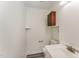Small bathroom offers a traditional vanity and storage cabinet, perfect for guests at 7315 Sandy Creek Dr # 7, Raleigh, NC 27615
