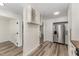 Stylish kitchen features stainless steel appliances, modern flooring, and ample storage space at 7315 Sandy Creek Dr # 7, Raleigh, NC 27615