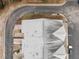 Birds eye view of rooftops showing the landscape and a grey roof at 763 Blossom Grove Dr, Cary, NC 27519