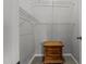 A compact walk-in closet with wire shelving and a wood nightstand at 763 Blossom Grove Dr, Cary, NC 27519