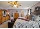 Comfortable main bedroom with a king-size bed, dressers, and neutral decor at 8008 Bright Oak Trl, Raleigh, NC 27616