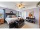 Large main bedroom with a king-size bed, dresser, and decorative accents at 8008 Bright Oak Trl, Raleigh, NC 27616