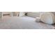 Large bonus room with neutral carpet, perfect as a playroom or entertainment area at 813 Whitley Way, Wendell, NC 27591