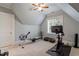 Attic room with fitness equipment and a slanted ceiling at 8904 Milden Hall Ct, Raleigh, NC 27615