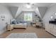 Bright bedroom featuring a cozy bed, modern furnishings, and plenty of natural light at 8904 Milden Hall Ct, Raleigh, NC 27615