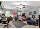 This bedroom is decorated with dark wood furniture, neutral colors, and plenty of space for work and rest at 8904 Milden Hall Ct, Raleigh, NC 27615