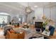 Inviting living room with fireplace, hardwood floors, and an open layout perfect for entertaining at 8904 Milden Hall Ct, Raleigh, NC 27615