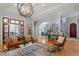 Comfortable living room featuring hardwood floors, stylish decor, and ample seating at 8904 Milden Hall Ct, Raleigh, NC 27615