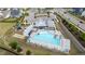 Bird's eye view of community pool with seating and recreational facilities, set in a well-kept neighborhood at 8925 Lee Brown Ridge Dr, Wake Forest, NC 27587