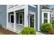 Charming front entrance with a wreath and well-maintained landscaping that leads to the front door at 8925 Lee Brown Ridge Dr, Wake Forest, NC 27587