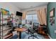 Well-appointed office with built-in shelves, desk, and large window for lots of natural light at 8925 Lee Brown Ridge Dr, Wake Forest, NC 27587