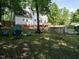 Beautiful backyard with above ground pool, a deck, and patio area at 924 Magnolia Ridge Way, Fuquay Varina, NC 27526