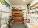 View of Storage Room with wooden cabinet and metal shelves at 924 Magnolia Ridge Way, Fuquay Varina, NC 27526