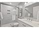 Bathroom with a large glass shower, vanity, and tile floors at 9900 Two Robins Ct, Raleigh, NC 27613