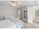 Bedroom with a closet, carpet floors, and ceiling fan at 9900 Two Robins Ct, Raleigh, NC 27613