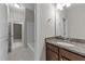 Well-lit bathroom with a granite countertop, a vanity, and a tub-shower combination at 10 Stillwood Ct, Clayton, NC 27520