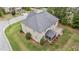 Rear exterior view of a home featuring a deck and screened in porch at 10 Stillwood Ct, Clayton, NC 27520