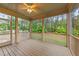 Relaxing screened porch overlooking a private, wooded backyard at 10 Stillwood Ct, Clayton, NC 27520