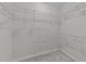 Large walk-in closet with custom shelving and ample storage space at 10 Stillwood Ct, Clayton, NC 27520