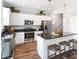 Modern kitchen features stainless steel appliances, granite countertops, and a functional center island at 100 Cordoba Dr, Franklinton, NC 27525