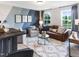 Cozy sitting area featuring modern decor, comfortable seating, and natural light at 100 Cordoba Dr, Franklinton, NC 27525