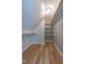Spacious closet with hardwood floors, hanging bar and built in shelves at 104 Tutbury Pl, Cary, NC 27519