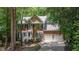 Beautiful two-story brick home featuring a two-car garage, gabled roof, and charming curb appeal at 104 Tutbury Pl, Cary, NC 27519