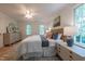 Cozy main bedroom with hardwood floors, soft rug, and tranquil decor at 104 Tutbury Pl, Cary, NC 27519