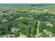 An aerial view of a beautiful neighborhood with tree-lined streets and well-maintained homes, creating a serene and inviting atmosphere at 10540 Byrum Woods Dr, Raleigh, NC 27613