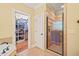 Bathroom featuring a glass shower and a view into the adjacent walk-in closet at 10540 Byrum Woods Dr, Raleigh, NC 27613