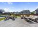 Inviting backyard with a patio, comfortable seating, and a fire pit at 109 Obsidian Dr, Holly Springs, NC 27540