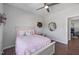 Cozy bedroom features wood floors and stylish decor at 109 Obsidian Dr, Holly Springs, NC 27540
