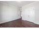 This bedroom has hardwood floors with two closets for storage at 109 Obsidian Dr, Holly Springs, NC 27540