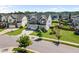 Charming gray home with a well-kept lawn and curb appeal in a suburban neighborhood at 109 Obsidian Dr, Holly Springs, NC 27540