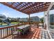Relaxing outdoor patio with dining area and pergola, perfect for entertaining at 109 Obsidian Dr, Holly Springs, NC 27540