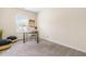 Comfortable bedroom features a work space and neutral decor at 1104 Arden Trace Ct, Fuquay Varina, NC 27526