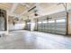 Spacious two car garage with unfinished drywall at 1104 Arden Trace Ct, Fuquay Varina, NC 27526
